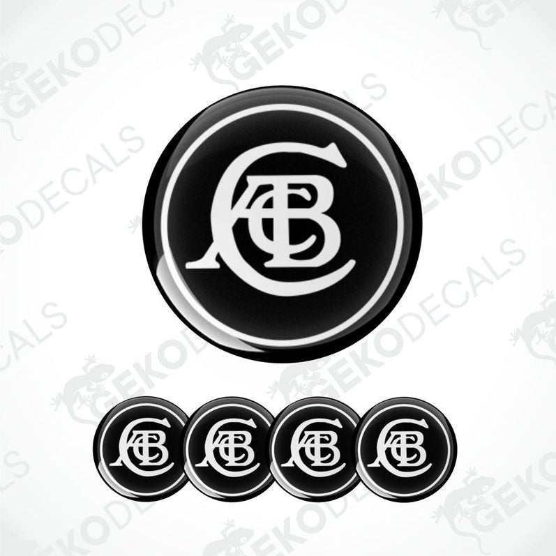 A set of four black and white vinyl decals with the LOTUS logo applied on a white background.