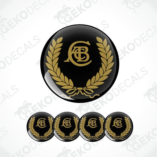 A set of four black vinyl stickers with a gold and white laurel wreath design and the letter 'C' in the center, placed on a white background.