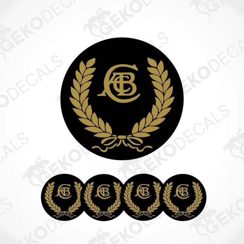 A set of four black vinyl stickers with a gold and white laurel wreath design and the letter 'C' in the center, placed on a white background.