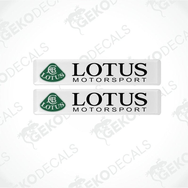 Two white vinyl stickers with the LOTUS MOTORSPORT logo in green and black.