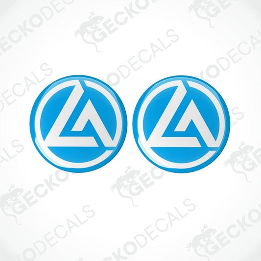 Two blue vinyl stickers with a white crescent moon design, placed on a white background.