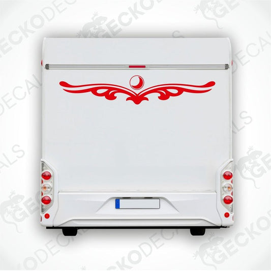 A white caravan with a red and black die cut decal design on the rear side.