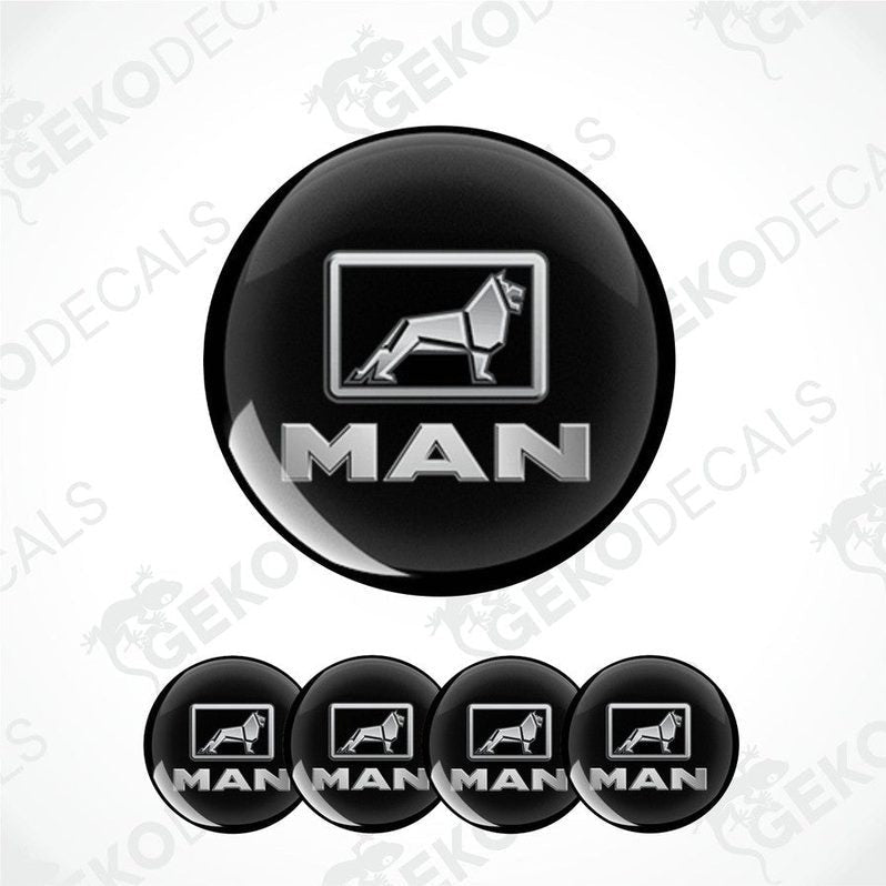 A set of four black vinyl stickers with a MAN logo and a graphic of a lion.
