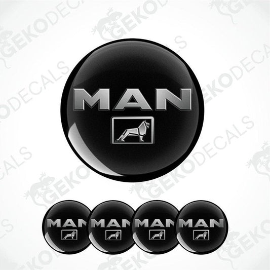 Set of four black round vehicle decals with the 'MAN' brand logo in white text.