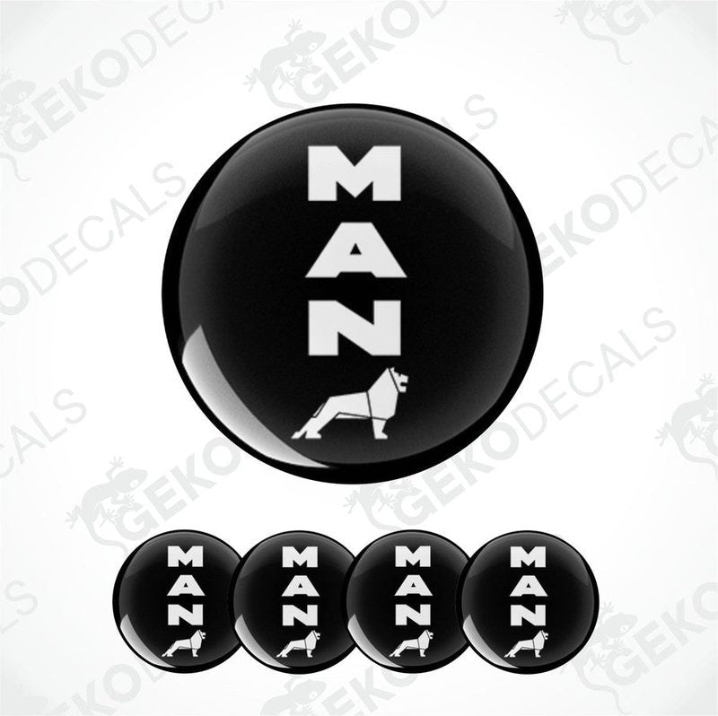 A set of black vinyl decals with the text 'MAN' and an image of a dog, presented in a round shape resembling a domed sticker.
