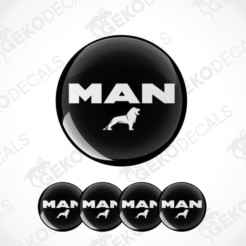 A set of four black vinyl stickers with the word 'MAN' and a graphic of a dog on them. The stickers have a glossy finish.