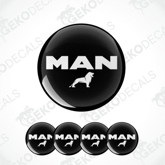 A set of four black vinyl stickers with the word 'MAN' and a graphic of a dog on them. The stickers have a glossy finish.