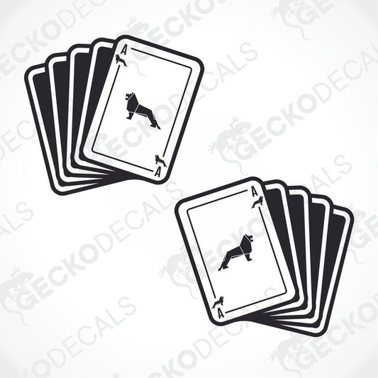 Two black and white vehicle decals depicting a stack of playing cards with a silhouette of a dog on the face card, delivered on transfer paper.