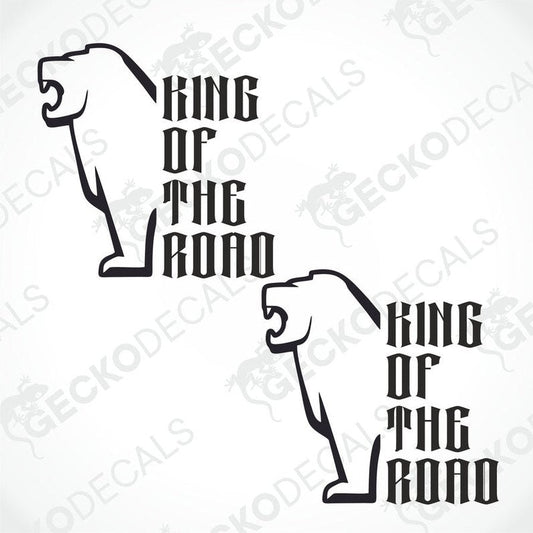 Two black and white stickers with the text 'KING OF THE ROAD' and a graphic of a bear's head and body on each sticker.