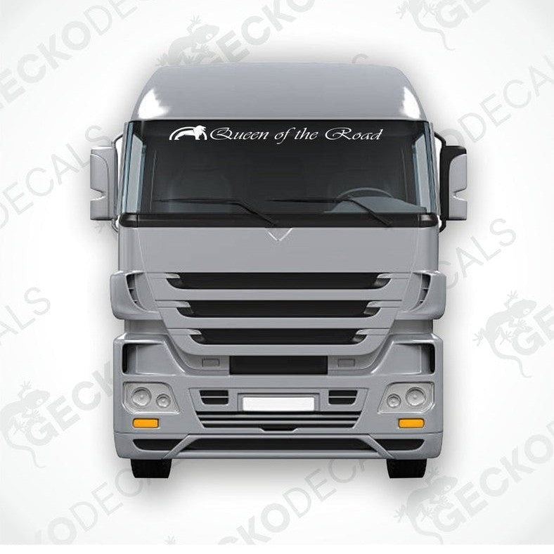 A die cut decal with the phrase 'Queen of the Road' positioned on the windshield of a gray truck.