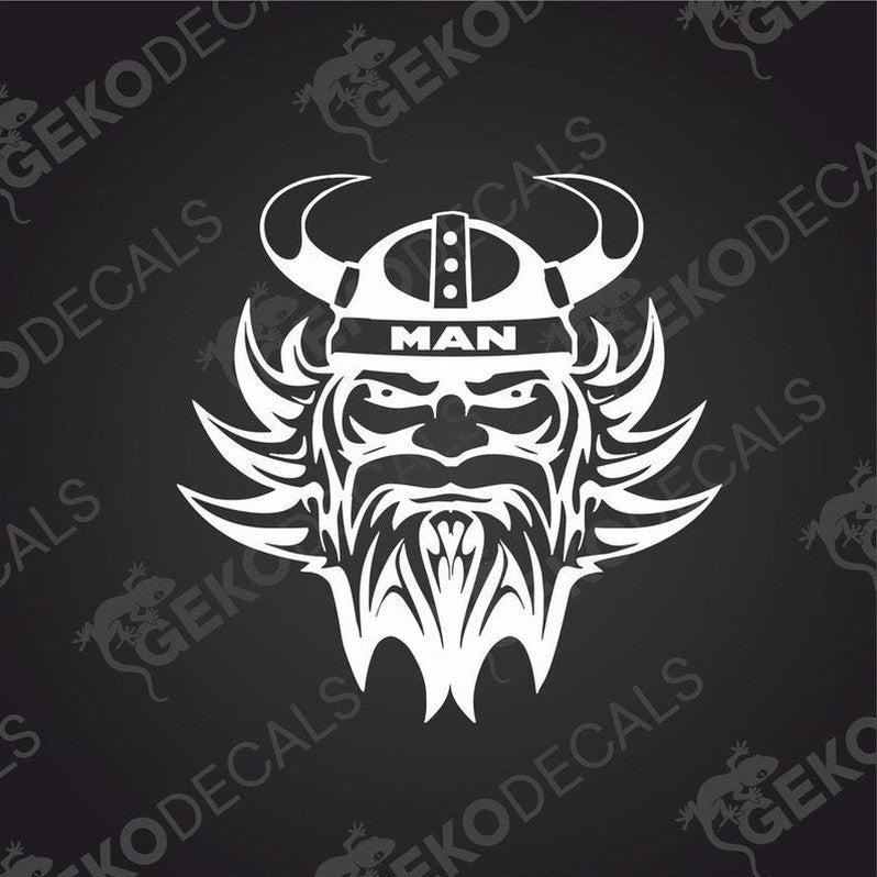 A die cut decal of a Viking helmet with the word 'MAN' on it, presented on a dark background.