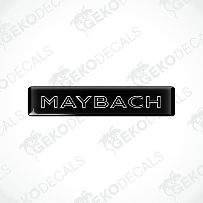 Rectangular black vehicle decals with the text 'MAYBACH' in capital letters