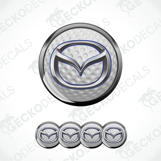 Mazda logo on a golf ball with additional logos below on a white background.