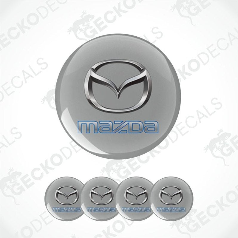 Set of Mazda logo emblems on a white background