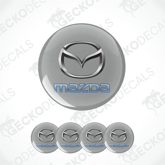 Set of Mazda logo emblems on a white background