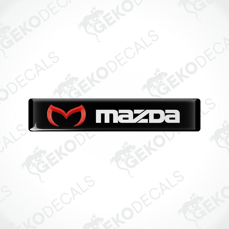  Black vinyl stickers with a red and white Mazda logo on them.