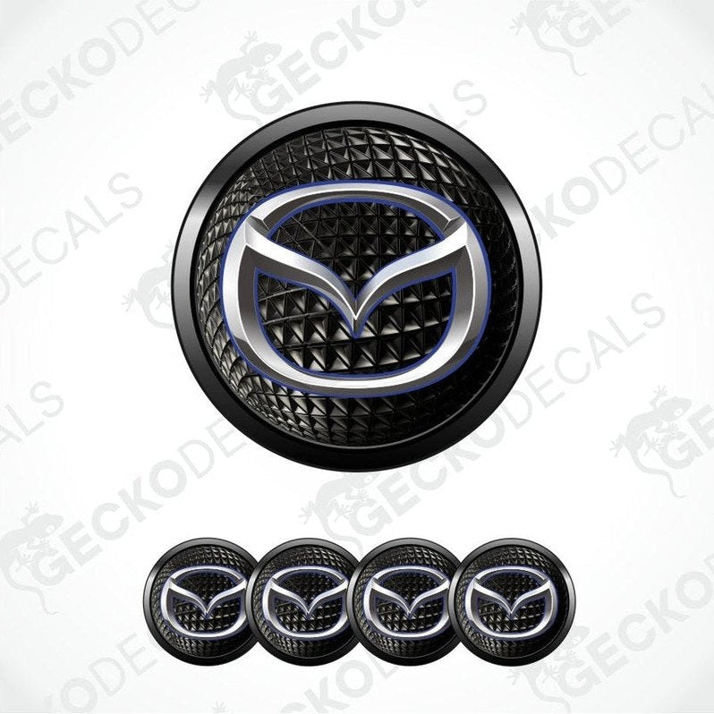 Mazda logo emblem with carbon fiber texture on a white background