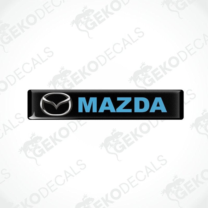  Black, blue, and silver Mazda branded vinyl decals.