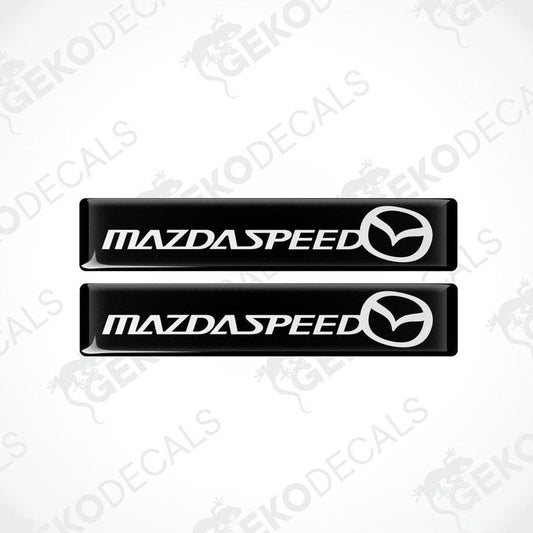 Two black vinyl stickers with the MazdaSpeed logo in white.