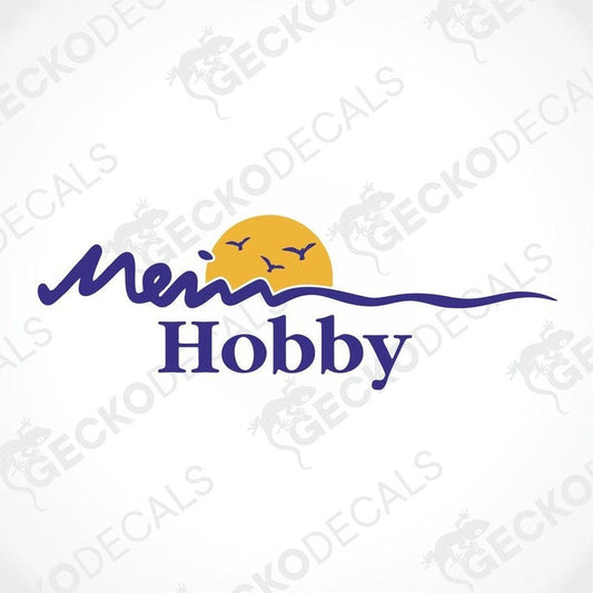 A die cut sticker with the text 'Mein Hobby' and a graphic of birds flying towards the sun.