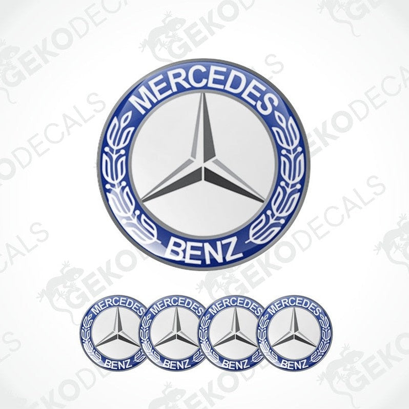 A set of vinyl decals with the Mercedes-Benz logo, including one large emblem and four smaller ones with a blue, white, and silver color scheme.