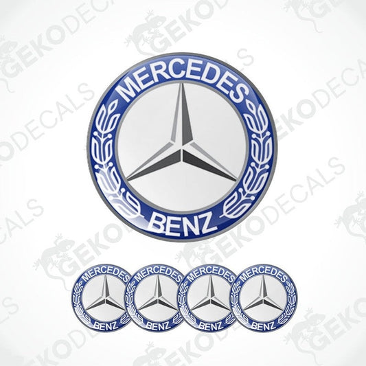 A set of vinyl decals with the Mercedes-Benz logo, including one large emblem and four smaller ones with a blue, white, and silver color scheme.
