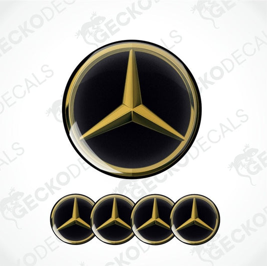 Mercedes-Benz logo decal with gold and black colors on a black background.