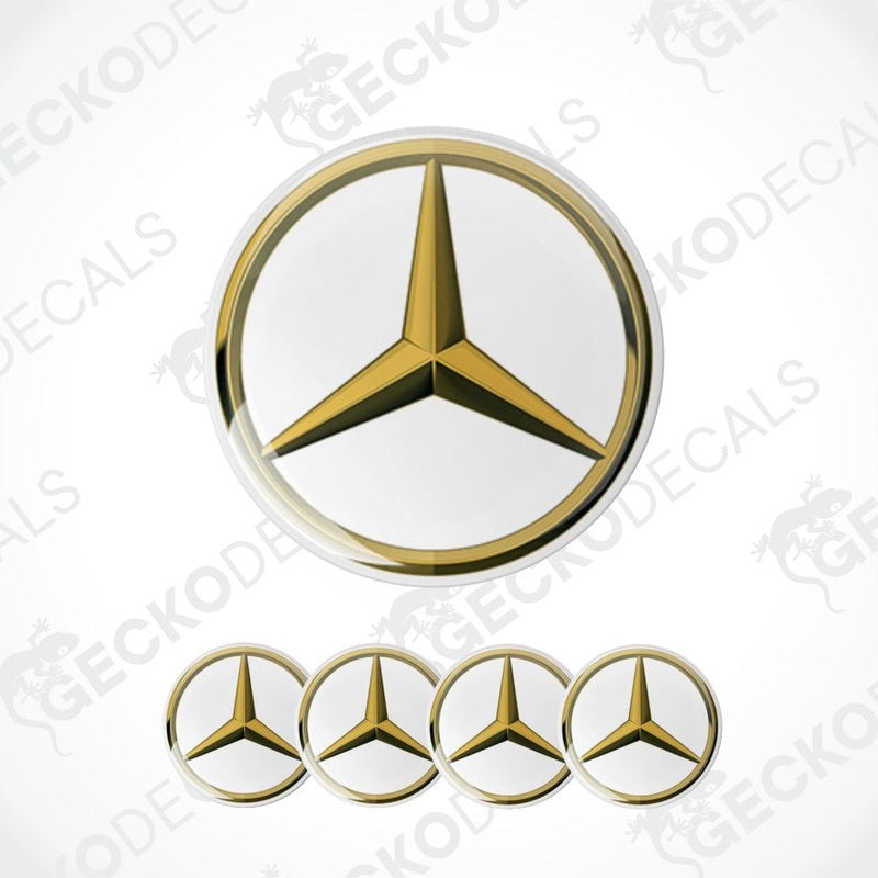 Mercedes-Benz logo decal with gold and white colors on a white background.