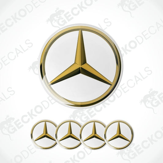 Mercedes-Benz logo decal with gold and white colors on a white background.