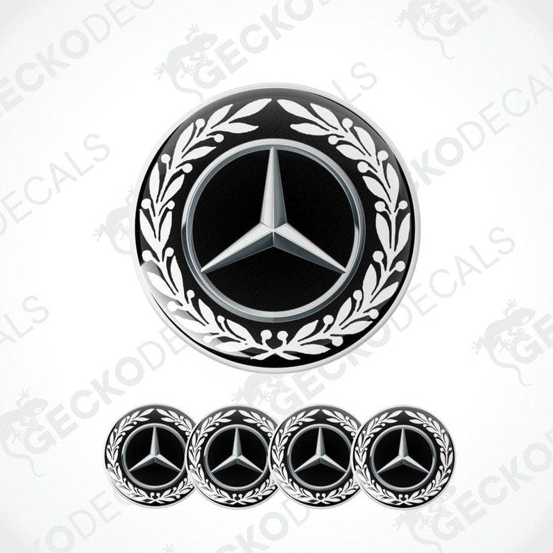 Mercedes-Benz logo with decorative laurel wreath and five smaller logos below on a white background.
