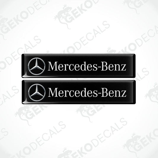 Two black decals with the Mercedes-Benz logo