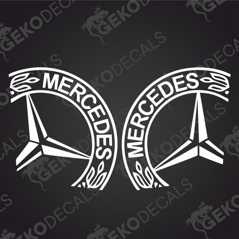 A set of two black decals with the Mercedes-Benz logo on each.