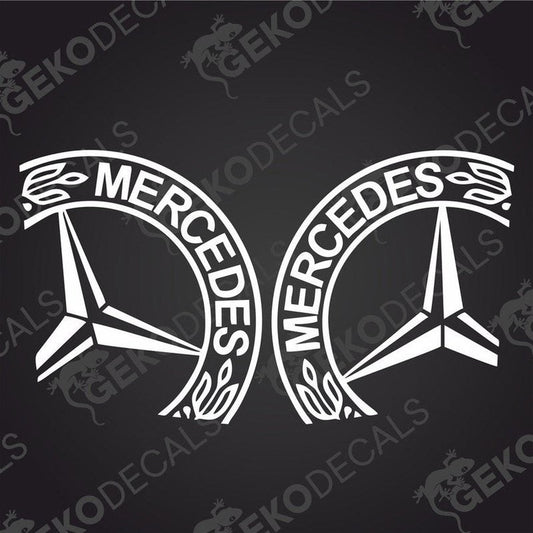 A set of two black decals with the Mercedes-Benz logo on each.