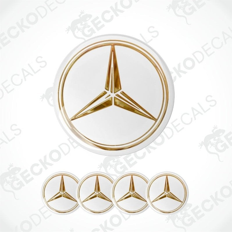 Gold Mercedes-Benz logo decal on a white background
