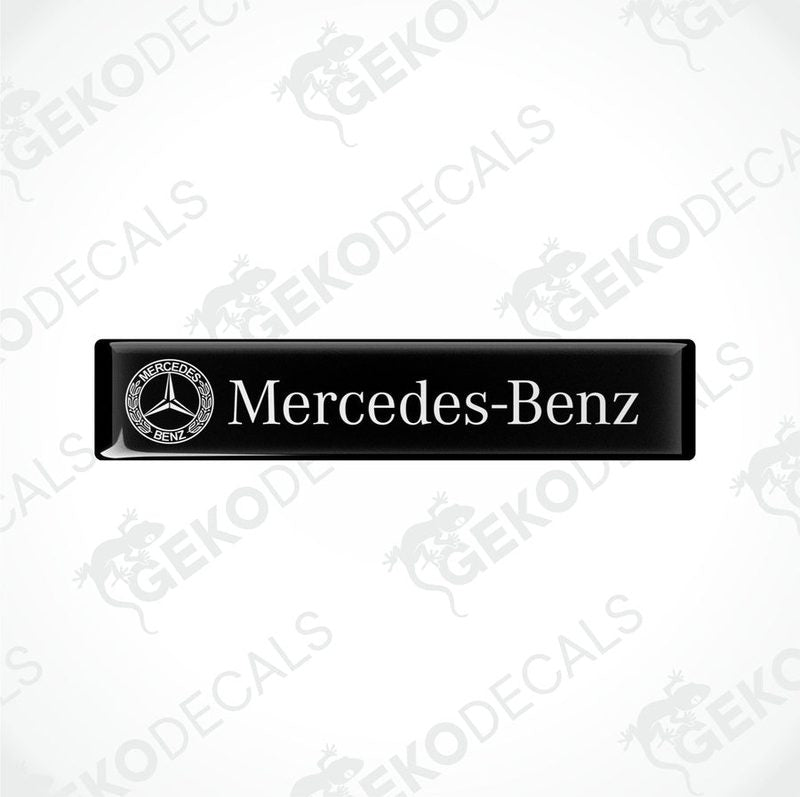  Black vinyl stickers with the Mercedes-Benz logo printed on them.