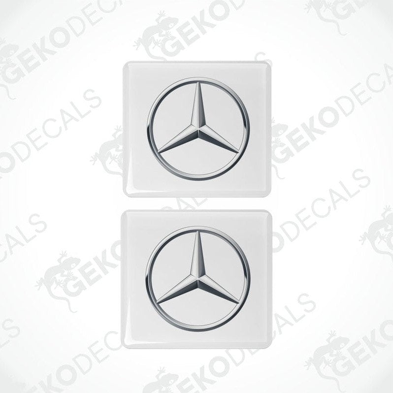Mercedes-Benz silver domed epoxy car decal set on gray background