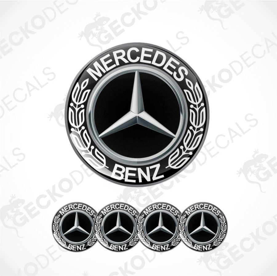 Mercedes-Benz logo with decorative laurel wreath and five smaller logos below on a white background.