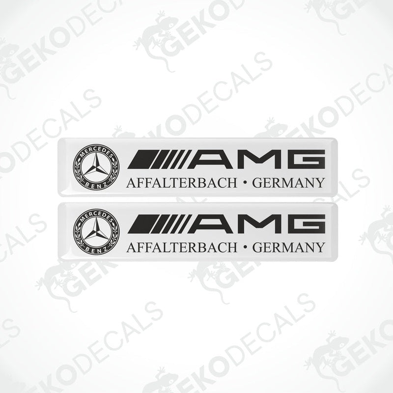 Two white vinyl stickers with the Mercedes-Benz AMG Affalterbach Germany branding.
