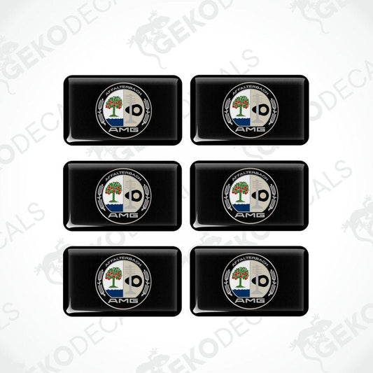 A set of six black rectangular car decals with a white and green logo on them.