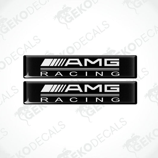Two black vinyl stickers with the text 'AMG RACING' in white, placed against a white background.