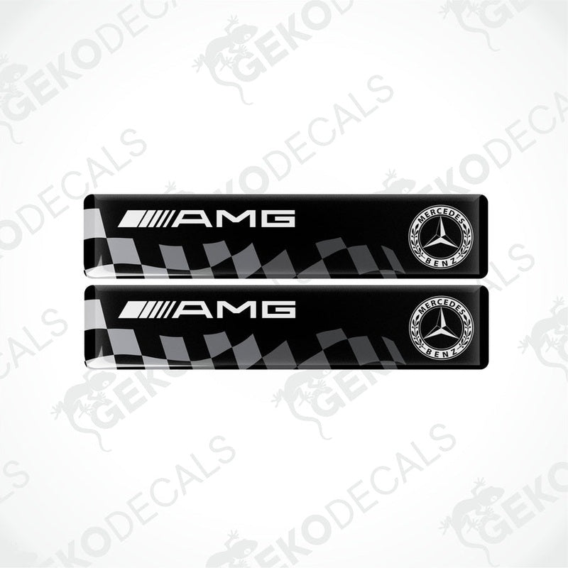Two black Mercedes-Benz AMG racing decals with white and silver brand logos.