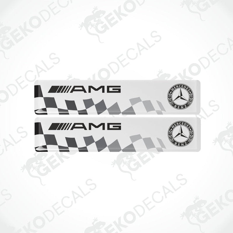 Two white Mercedes-Benz AMG racing decals with black and silver brand logos.