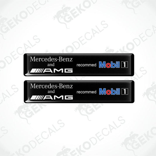 Two black vinyl decals with white and silver text reading 'Mercedes-Benz and AMG recommended Mobil1', against a white background.