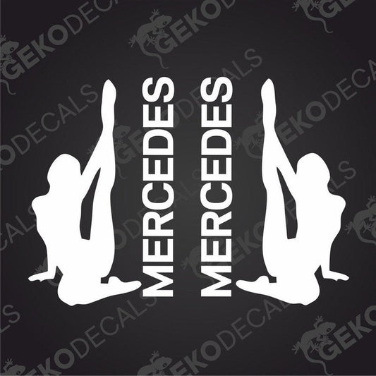 A set of two black decals with the text 'MERCEDES' and an illustration of a girl sitting in a Mercedes-Benz vehicle.
