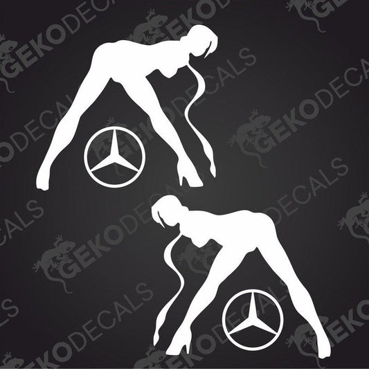 Two white die cut decals of a female figure with a Mercedes-Benz logo on the chest, one for the right side and one for the left, on a black background.