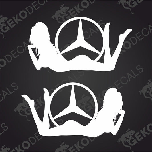 A pair of white die cut decals featuring a stylized female figure with the Mercedes-Benz star logo, intended for use on vehicles.