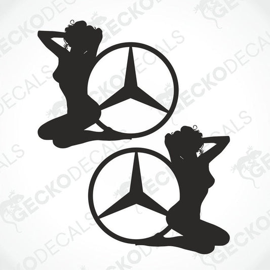 This image displays a set of two die-cut decals titled "Mercedes-Benz Girl," suitable for application on both interior and exterior surfaces. Each decal features a stylized silhouette of a woman sitting beside the iconic Mercedes-Benz star logo, designed in a black and white motif.