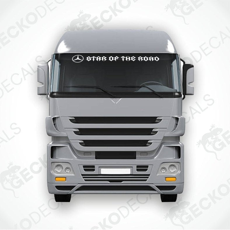 A gray Mercedes-Benz truck with a 'STAR OF THE ROAD' decal on the windshield.