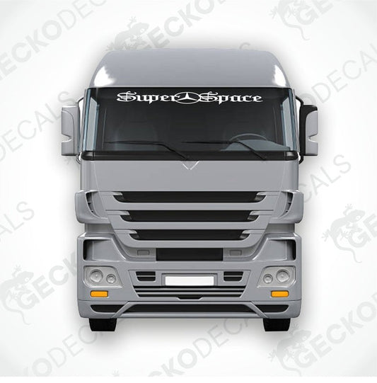 A die cut decal with the text 'Super Space' displayed on the front of a truck windshield.