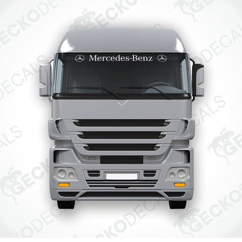 A front view of a Mercedes-Benz truck with a die cut decal on its windscreen.